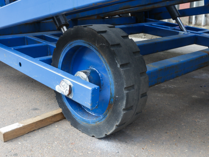 close-up on the blue loading ramp wheel